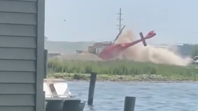 Watch: Helicopter flips, crashes near Michigan restaurant
