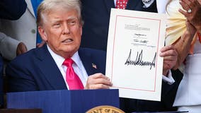 Trump signs 'big, beautiful' bill into law at White House July 4th picnic