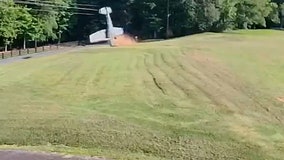 Watch: Small plane flips over in South Carolina yard after pilot's maneuver