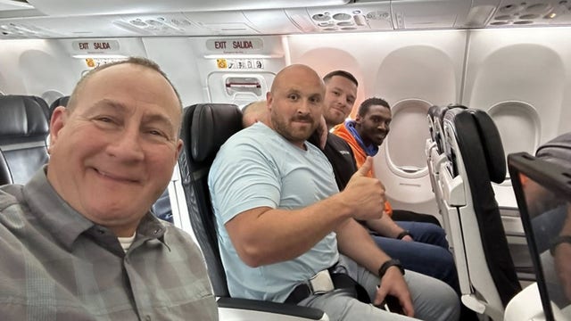 Smiling fugitive recaptured and returned to Kentucky after dramatic airport escape