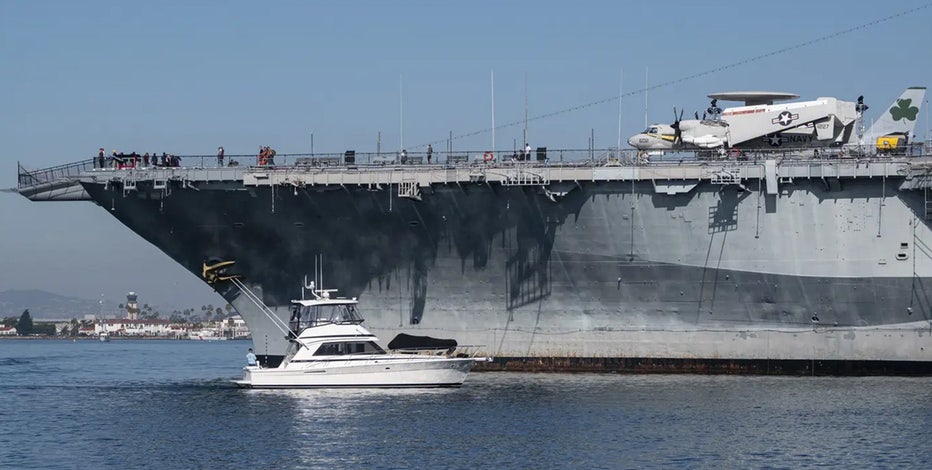Boat captain arrested after hit-and-run crash into USS Midway