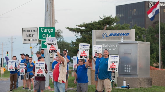 Boeing workers who build fighter jets go on strike. What we know