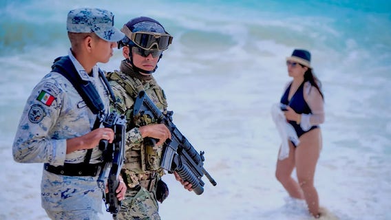 Americans in vacation hot spot may see more military than margaritas this summer