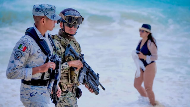 Americans in vacation hot spot may see more military than margaritas this summer