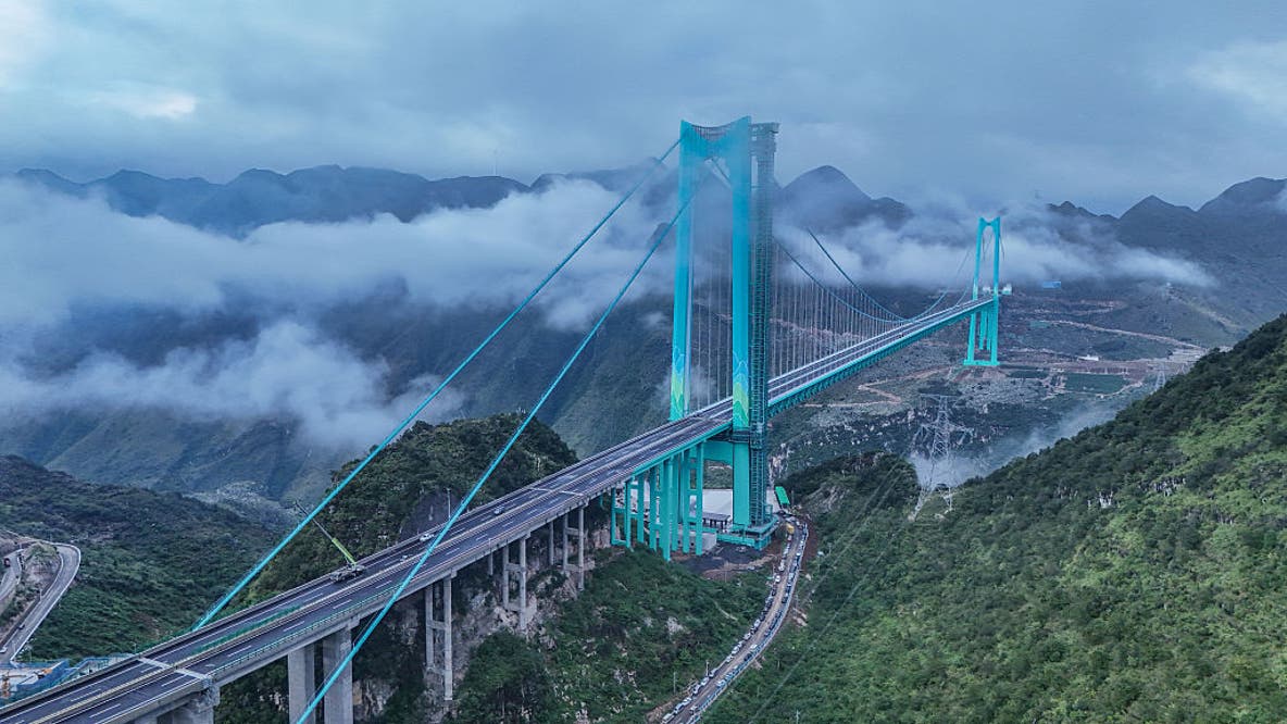 World's tallest bridge cuts 2-hour mountain trip to just 2 minutes