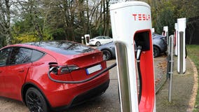 Parents say defective Tesla door handles trapped kids in back seat