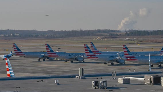 Stowaway found dead in American Airlines plane landing gear compartment at Charlotte airport