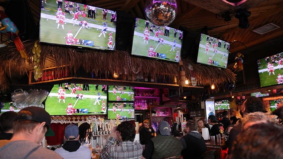 Here's how many Americans say they'll go into debt for football