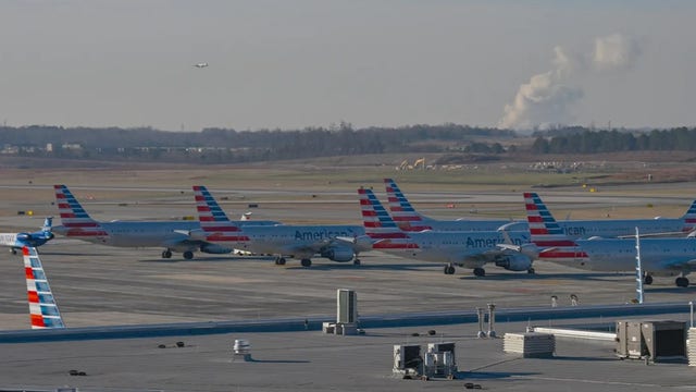 Stowaway found dead in American Airlines plane landing gear compartment at Charlotte airport