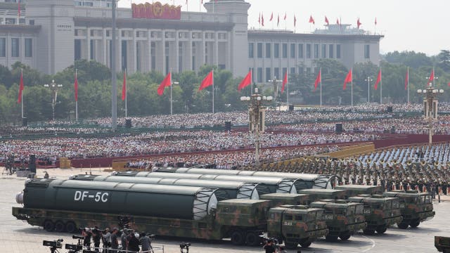 China’s military parade shows off new missiles, drones