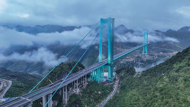 World's tallest bridge cuts 2-hour mountain trip to just 2 minutes