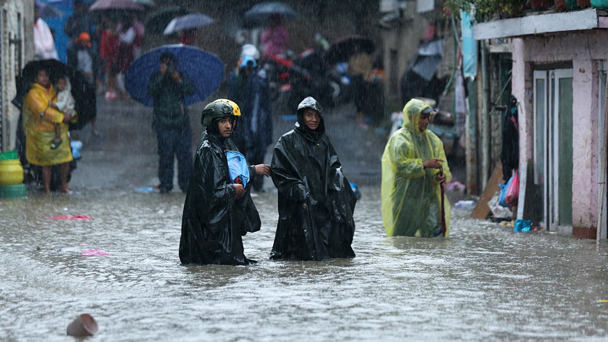 Mount Everest trekkers rescued after blizzard slams Tibet days after deadly flooding in Nepal