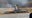 Plane crashes on Massachusetts highway in heavy rain, killing 2 and injuring 1