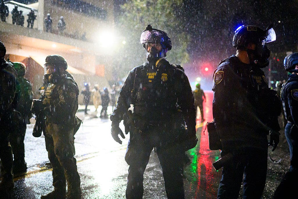 Portland protester accused of threatening officers and their families at ICE facility