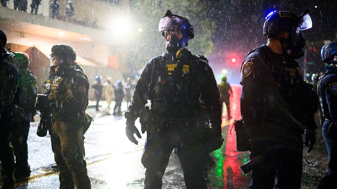 Portland protester accused of threatening officers and their families at ICE facility