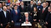 Trump signs bill ending historic government shutdown