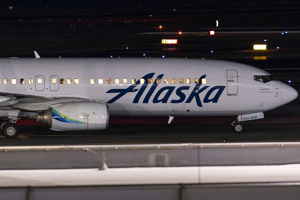 'We’re all going to die': Alaska Airlines passenger accused of trying to open cabin door midflight