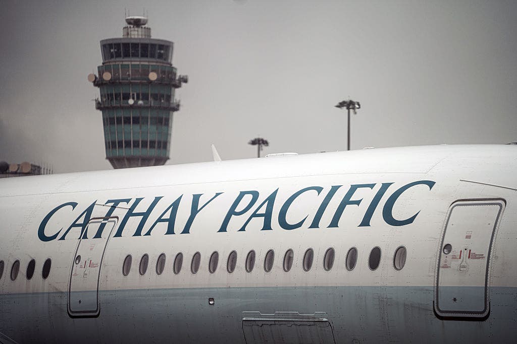 Airline passenger attempted to open plane door in mid-air, authorities say