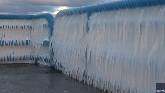 Video: Walls of icicles cover Lake Michigan pier as bitterly cold temperatures settle over Great Lakes