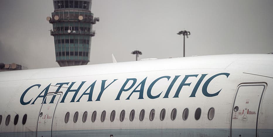 Airline passenger attempted to open plane door in mid-air