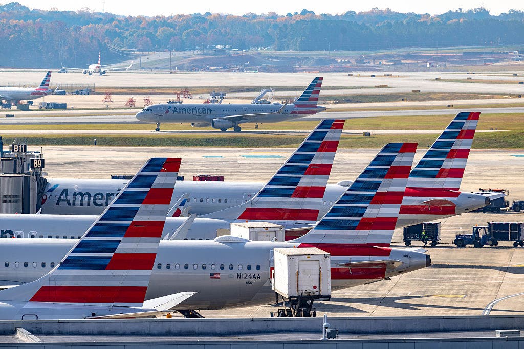 Inquiry begun after American Airlines flight reports mysterious blue light while trying to land
