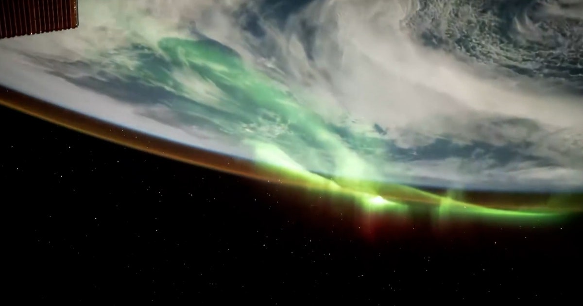 Watch: Green auroras ripple over Earth from orbit, creating