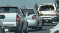 Drivers play rock, paper, scissors to pass time in traffic jam