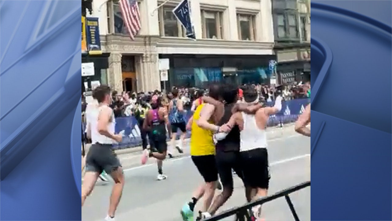 Watch: Marathoner says "natural instinct" made him help runner across finish line