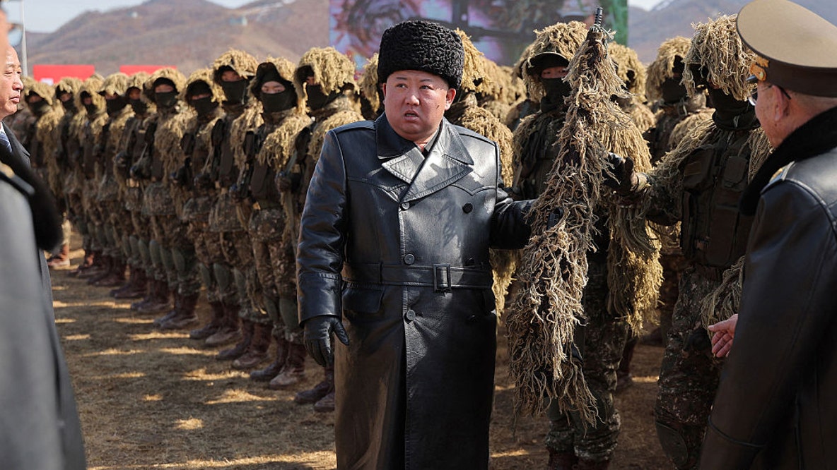 North Korean leader oversees missile tests from naval destroyer