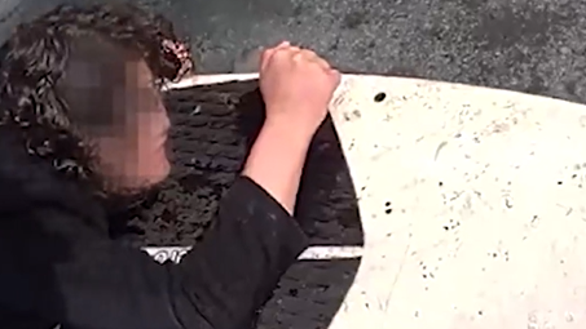 Watch: Alaska trooper uses surfboard to save teen who fell through ice