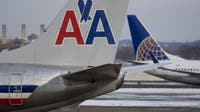 United Airlines CEO pitched American Airlines merger in talks with Trump