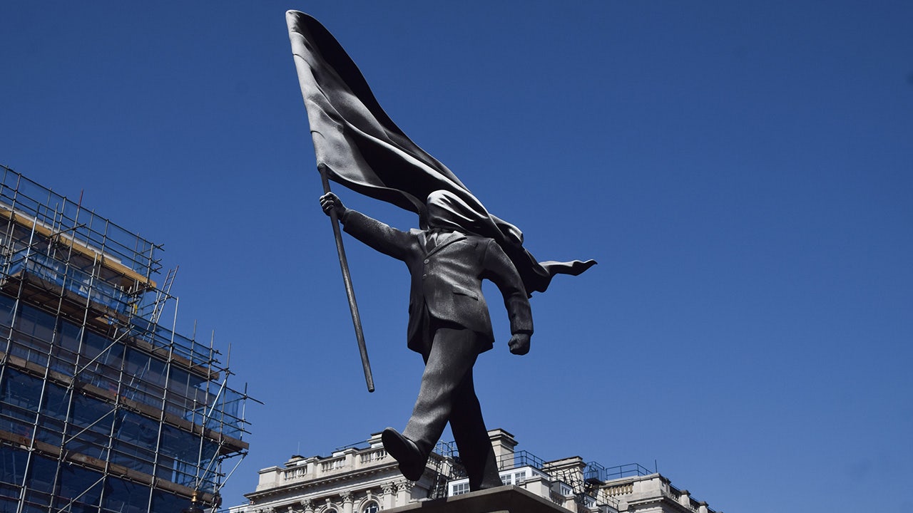 Banksy confirms he made new statue of man blinded by flag in London
