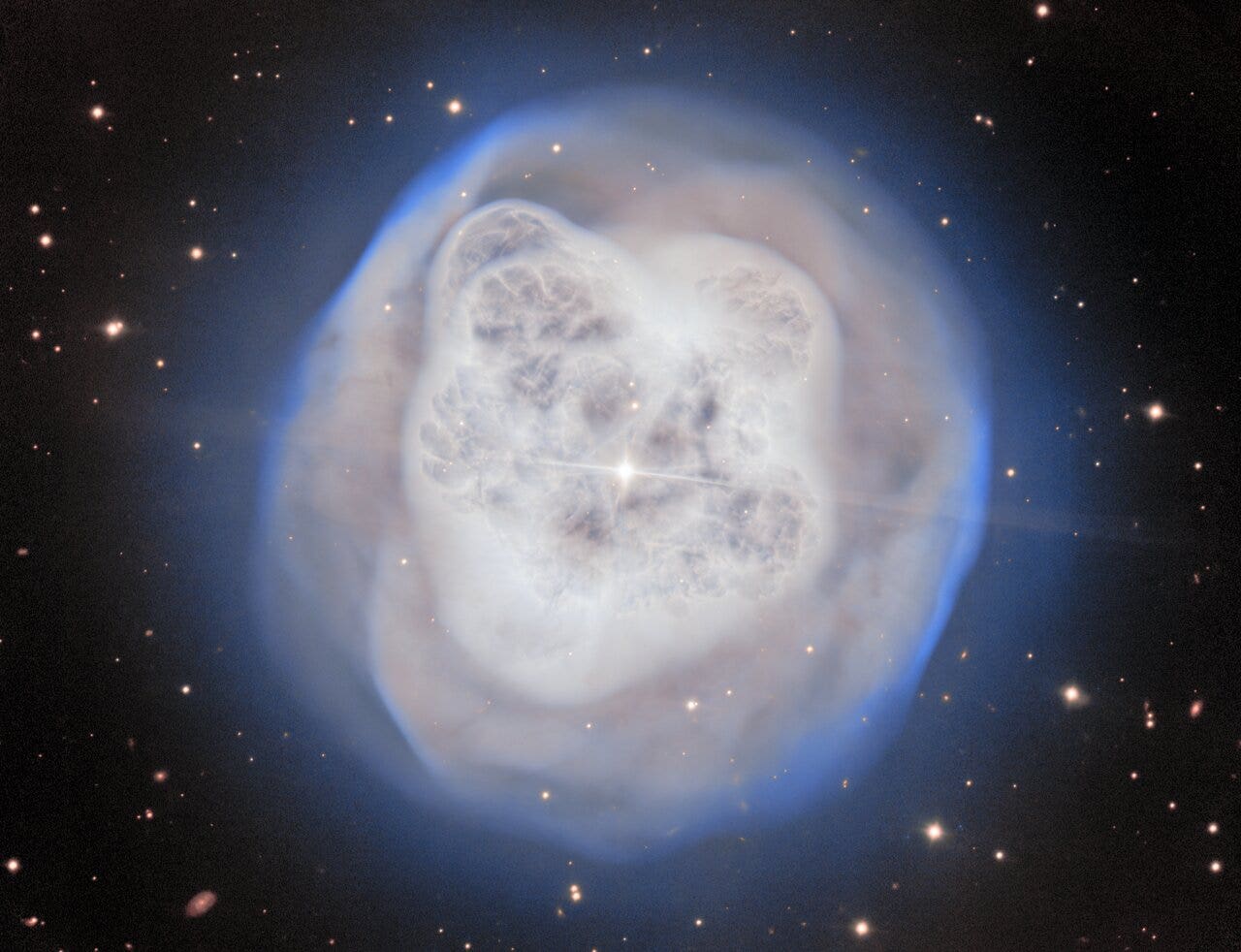 Dying star creates stunning 'crystal ball' nebula