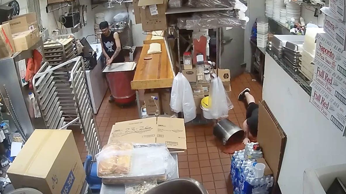 Watch: Manager at pizza restaurant trips, spills large pot of sauce