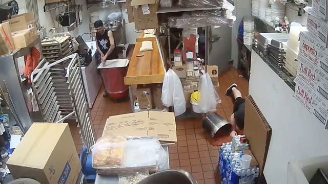 Watch: Manager at pizza restaurant trips, spills large pot of sauce