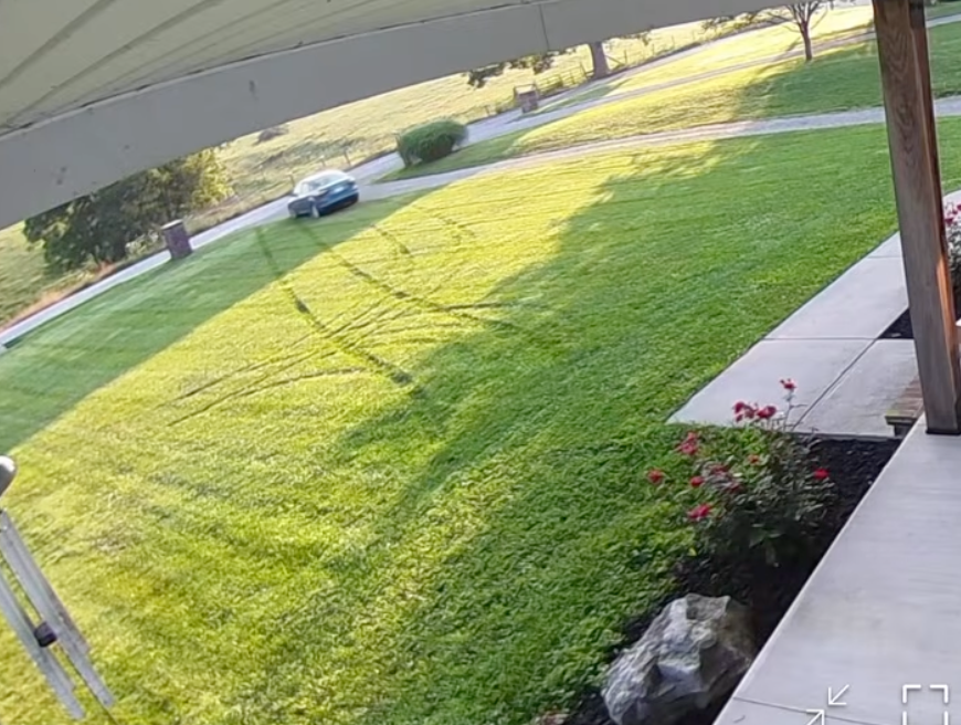 Amazon driver caught on camera driving on lawn