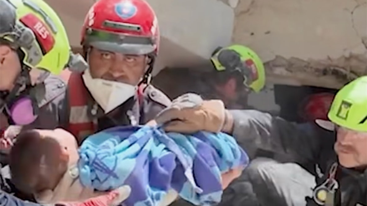 WATCH: The moment U.S. rescuers pull a baby from Venezuela ruins