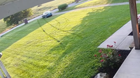 Amazon driver caught on camera driving on lawn