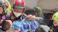 WATCH: The moment U.S. rescuers pull a baby from Venezuela ruins