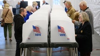 Judge bans Trump from enforcing proof of citizenship requirement to vote