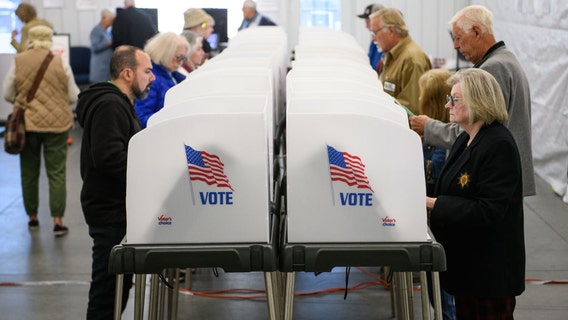 Judge bans Trump from enforcing proof of citizenship requirement to vote