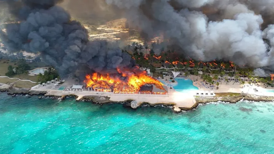 Aerial view of flames consuming resort
