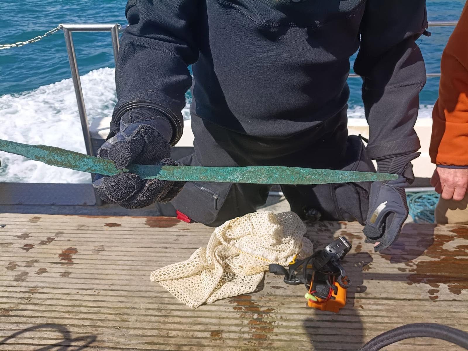 Divers discover ancient Bronze Age sword off the coast of England