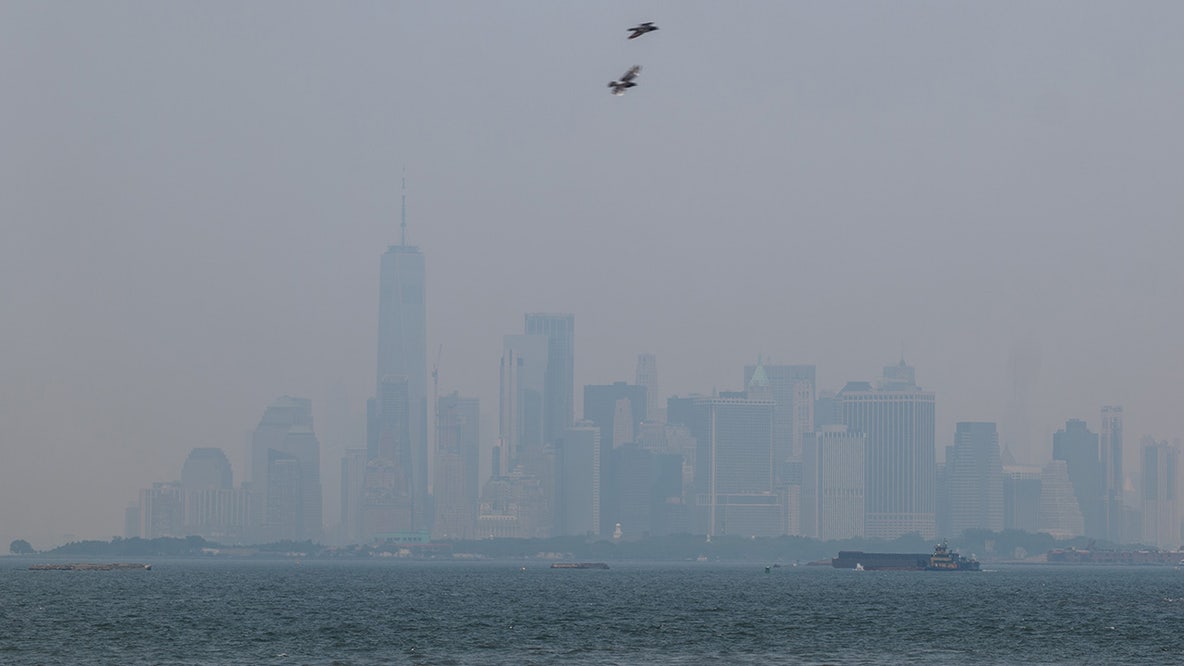 Wildfire smoke chokes skies in Midwest and Northeast