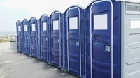 Man killed after portable toilet falls from truck onto interstate