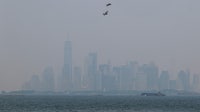 Wildfire smoke chokes skies in Midwest and Northeast