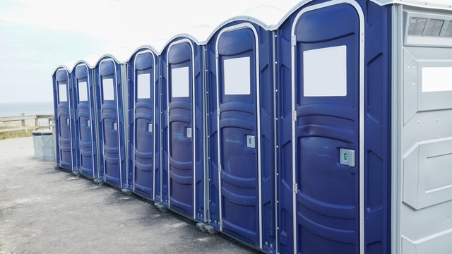Man killed after portable toilet falls from truck onto interstate