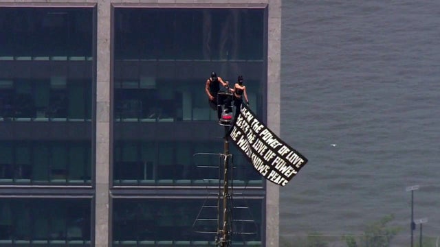Empire State Building climbers display quote on banner: What does it say?