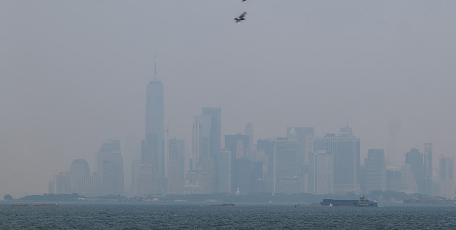 Wildfire smoke chokes skies in Midwest and Northeast
