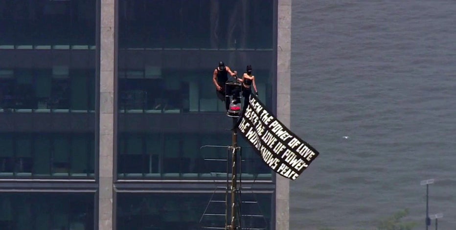 Empire State Building climbers display quote on banner: What does it say?